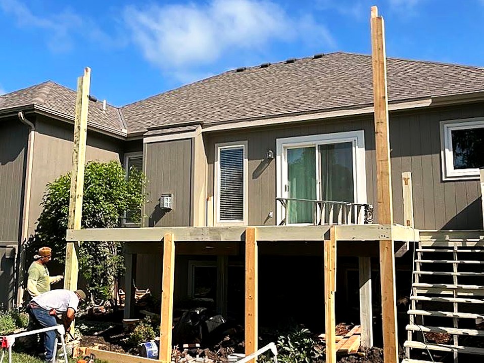 Posts set and braced for a new elevated porch.